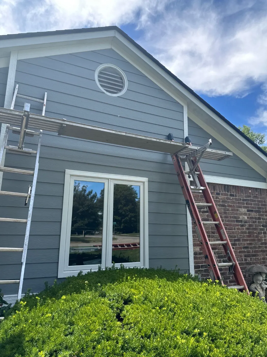 Storm-damaged siding documented in Eagle Trace